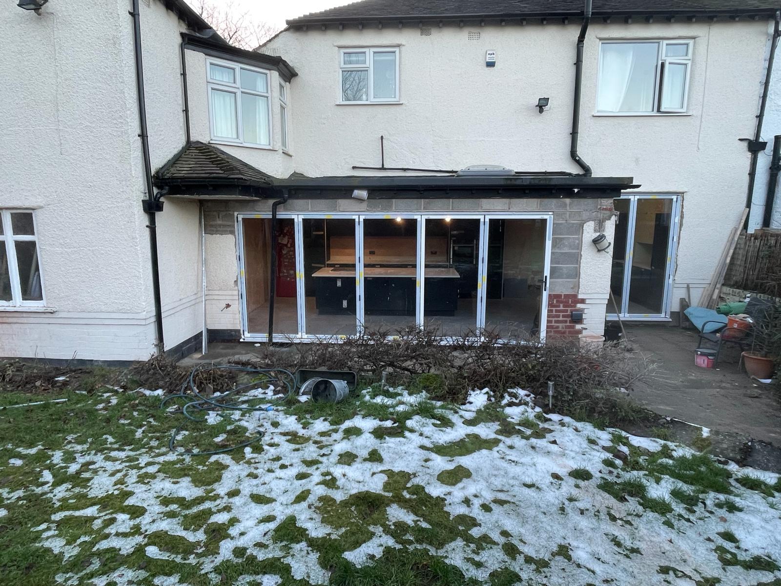 A rear extension with bi-fold doors opening onto the garden